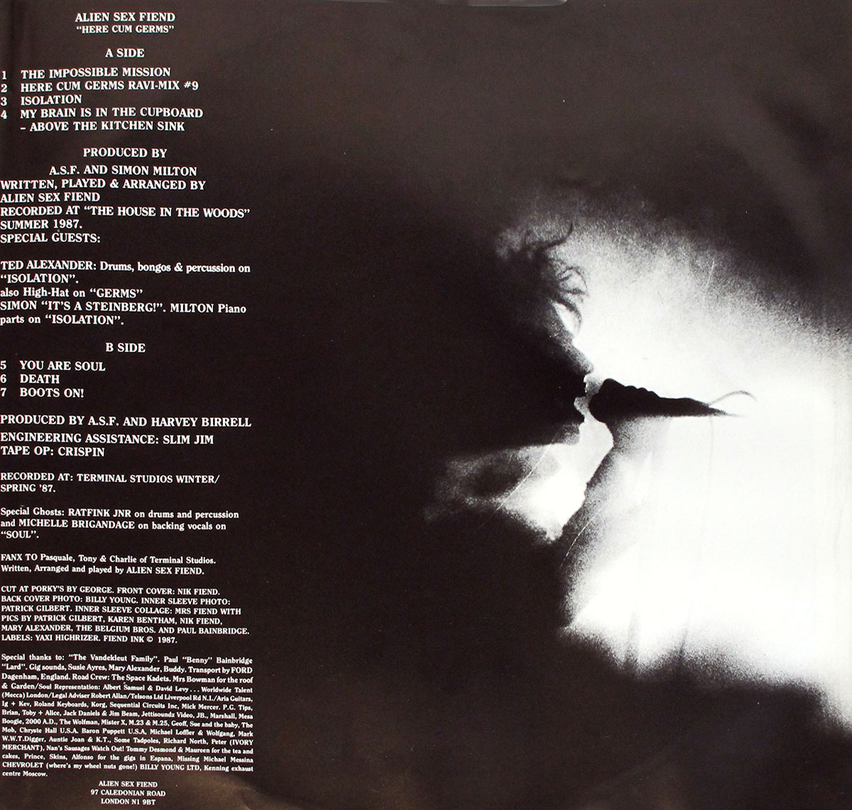 Second side of Here Cum Germs inner sleeve featuring full tracklist, production credits, and silhouette of vocalist in eerie black and white.